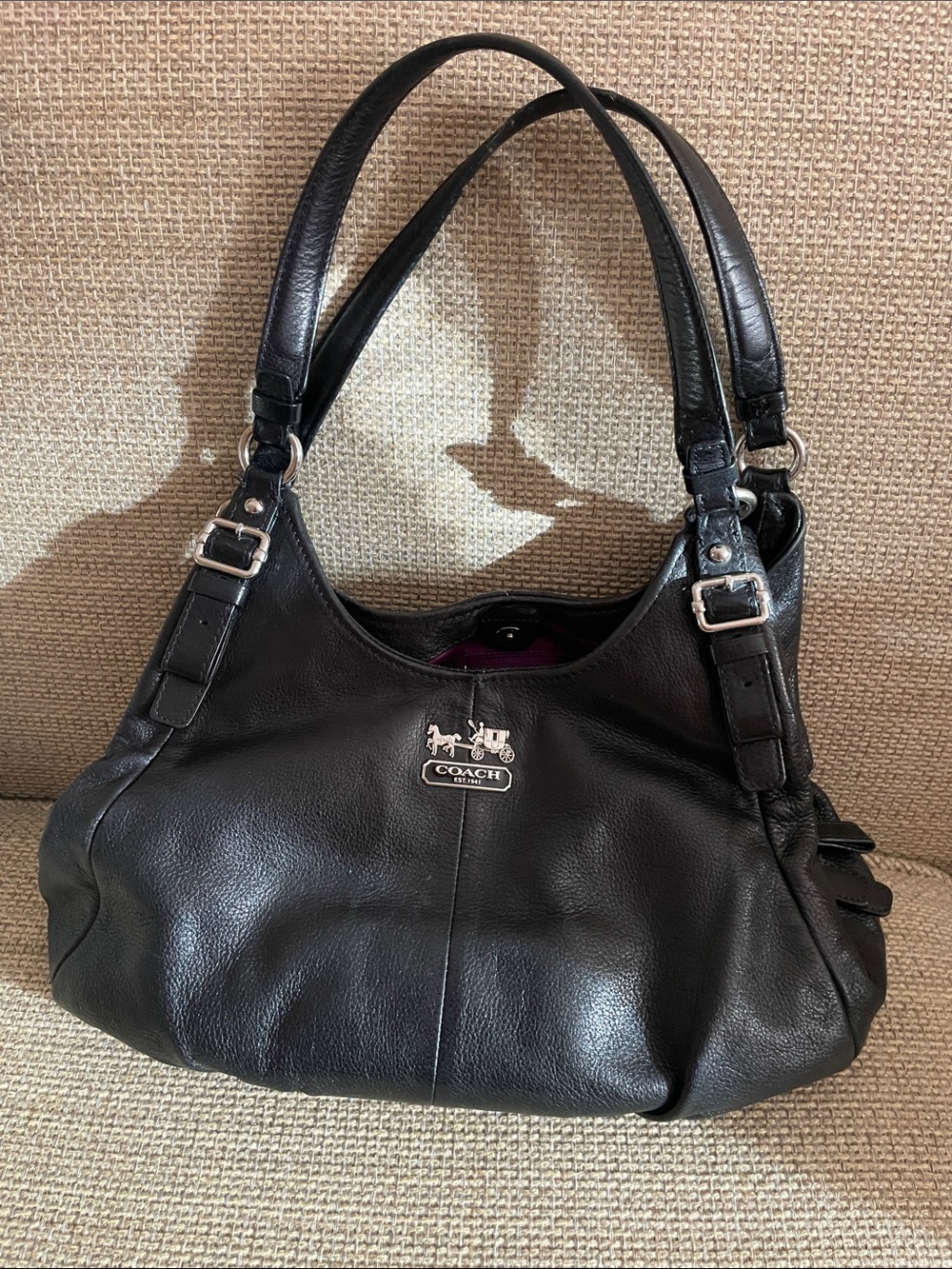 Coach Black Leather Shoulder Bag with Silver-Tone Logo.